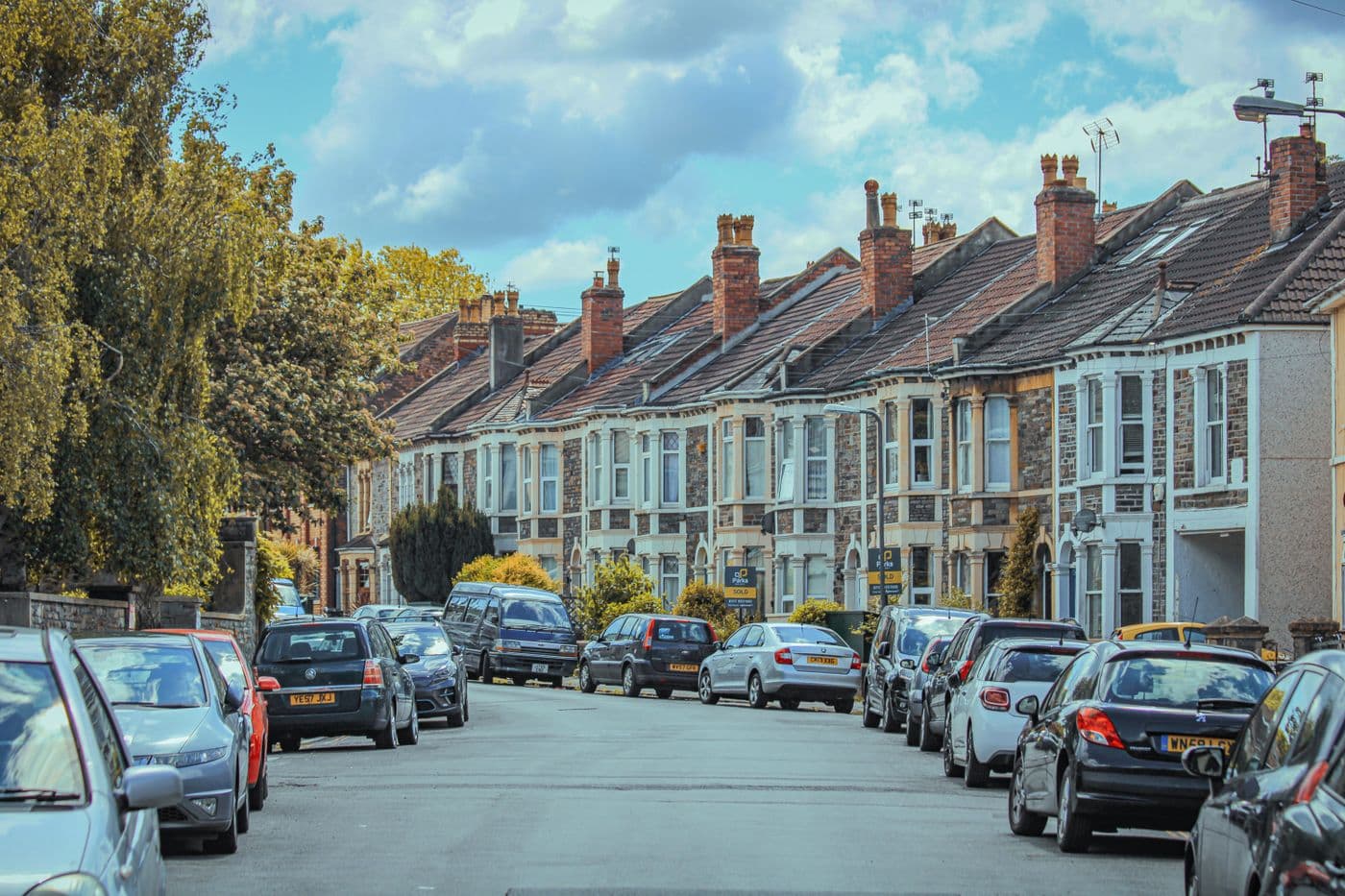 English terraced houses with cars parked outside